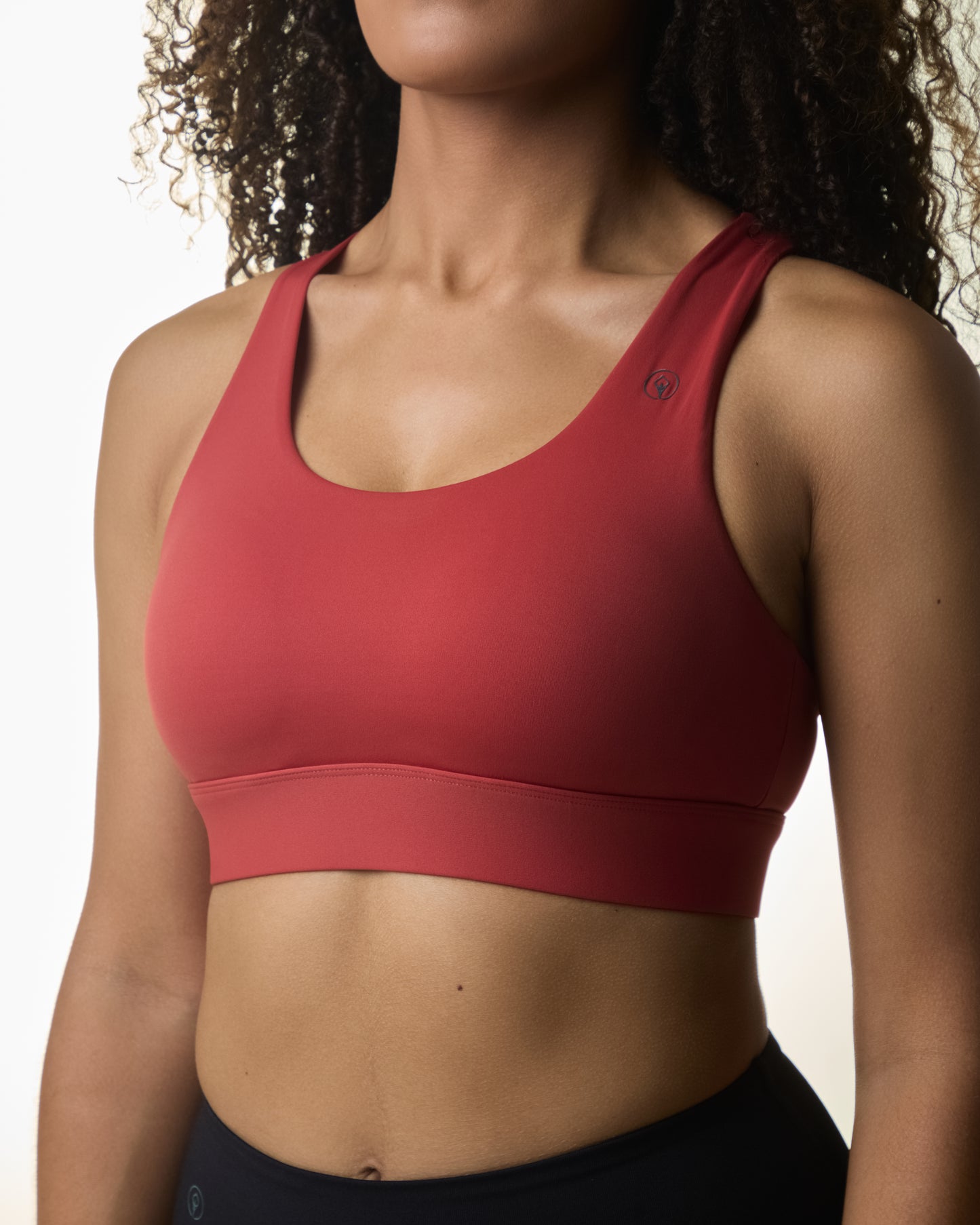Premium activewear for women - supportive sports bras and workout tops in various styles, designed for comfort and high performance