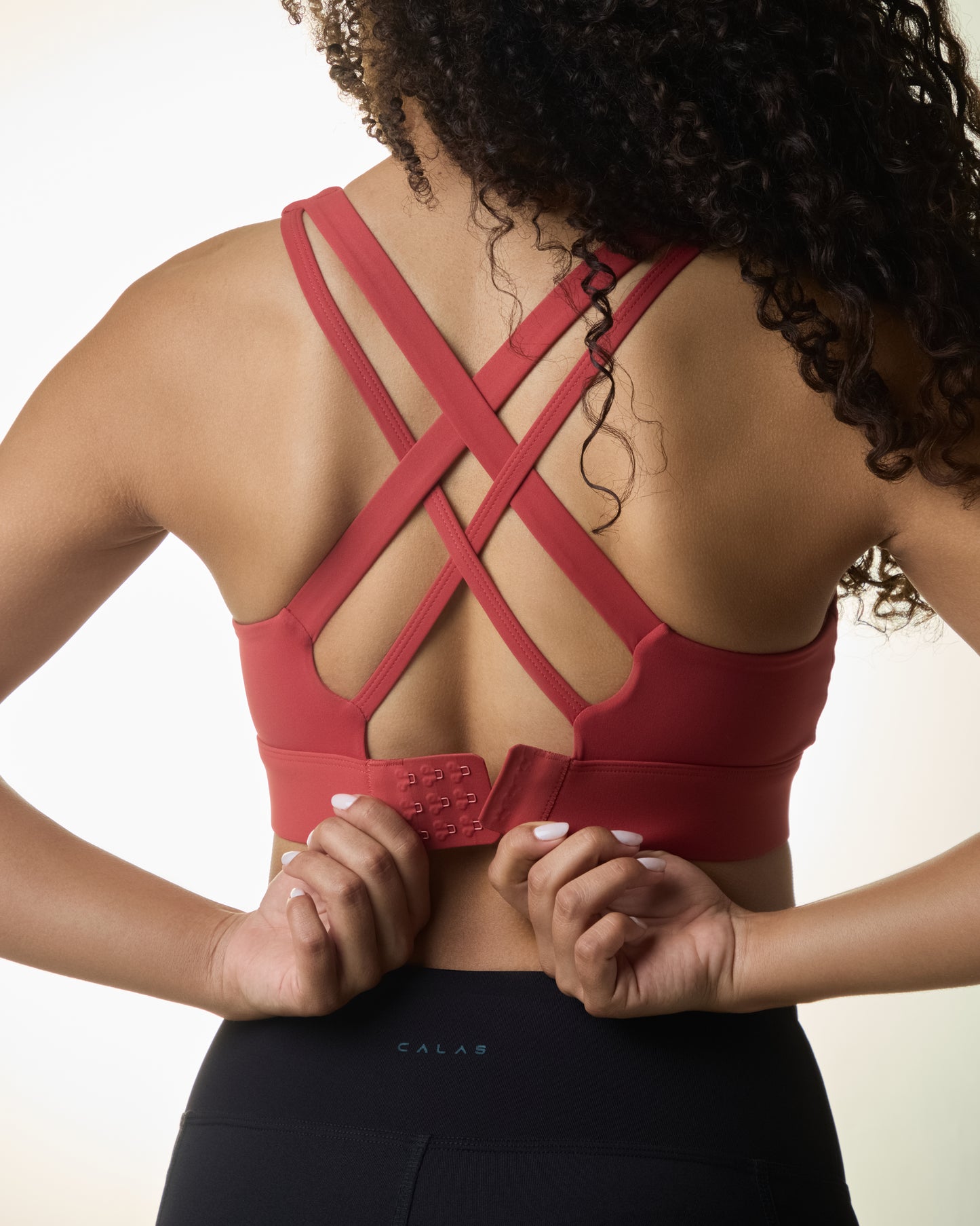 Premium activewear for women - supportive sports bras and workout tops in various styles, designed for comfort and high performance