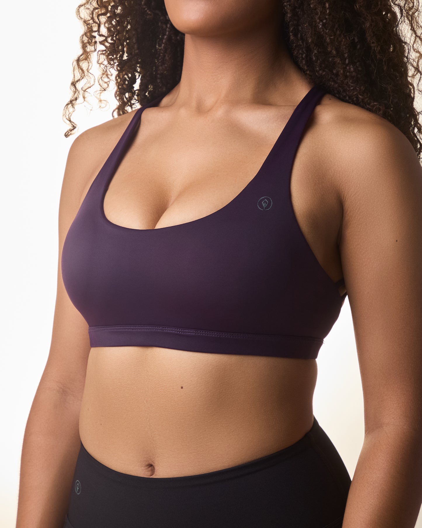 Premium activewear for women - supportive sports bras and workout tops in various styles, designed for comfort and high performance