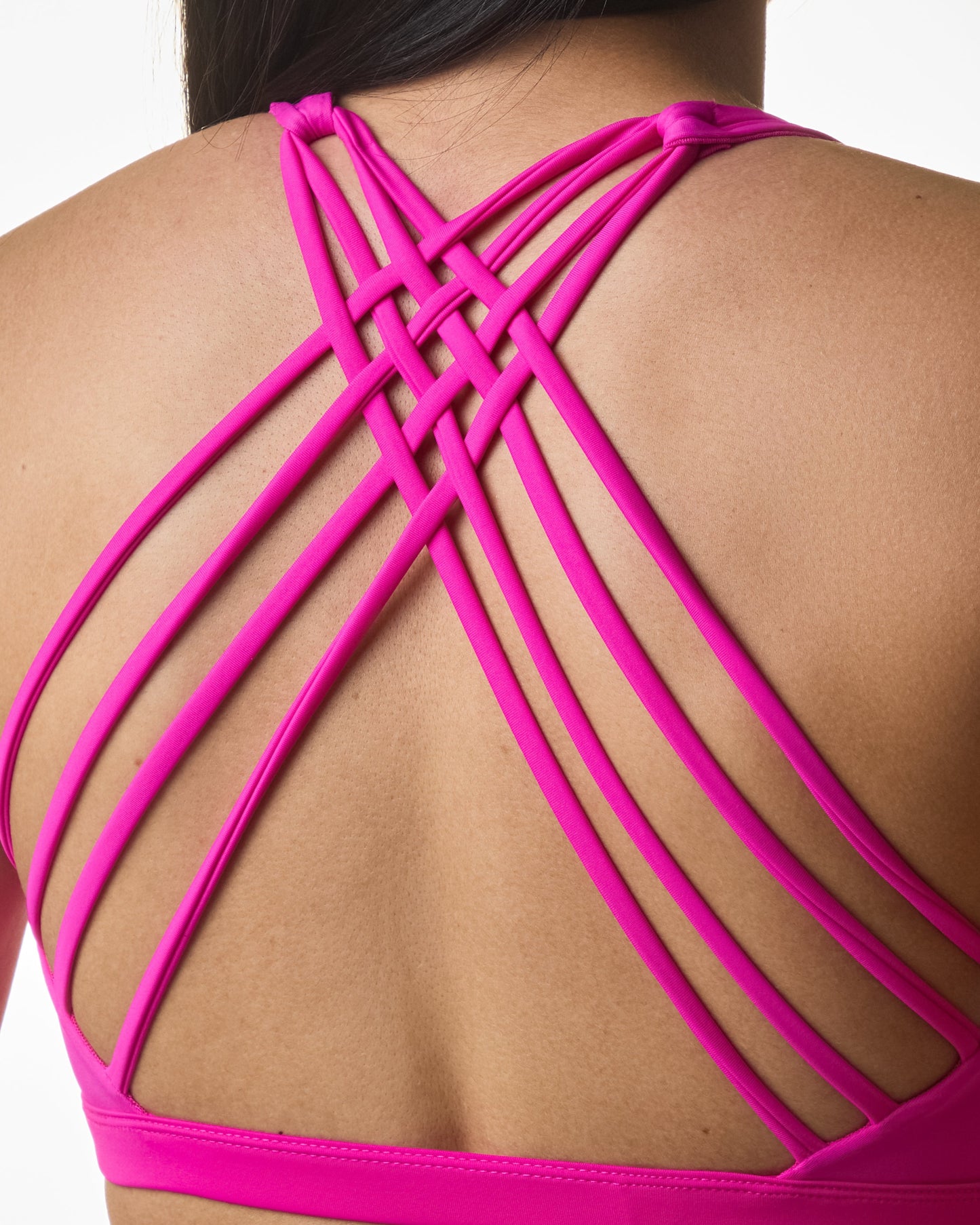 Premium activewear for women - supportive sports bras and workout tops in various styles, designed for comfort and high performance